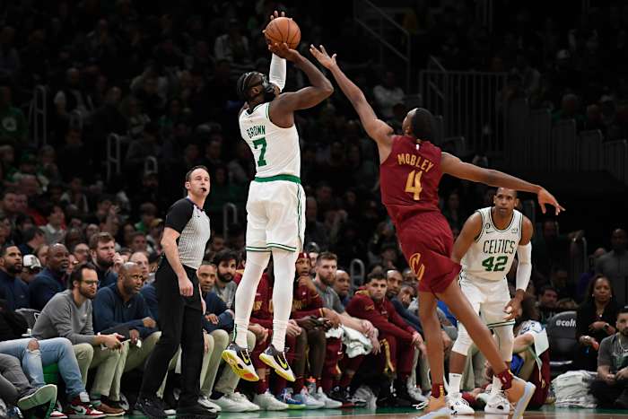 Mar 1, 2023; Boston, Massachusetts, USA; Boston Celtics guard Jaylen Brown (7) shoots the ball over Cleveland Cavaliers forward Evan Mobley (4) during the second half at TD Garden. Mandatory Credit: Bob DeChiara-USA TODAY Sports